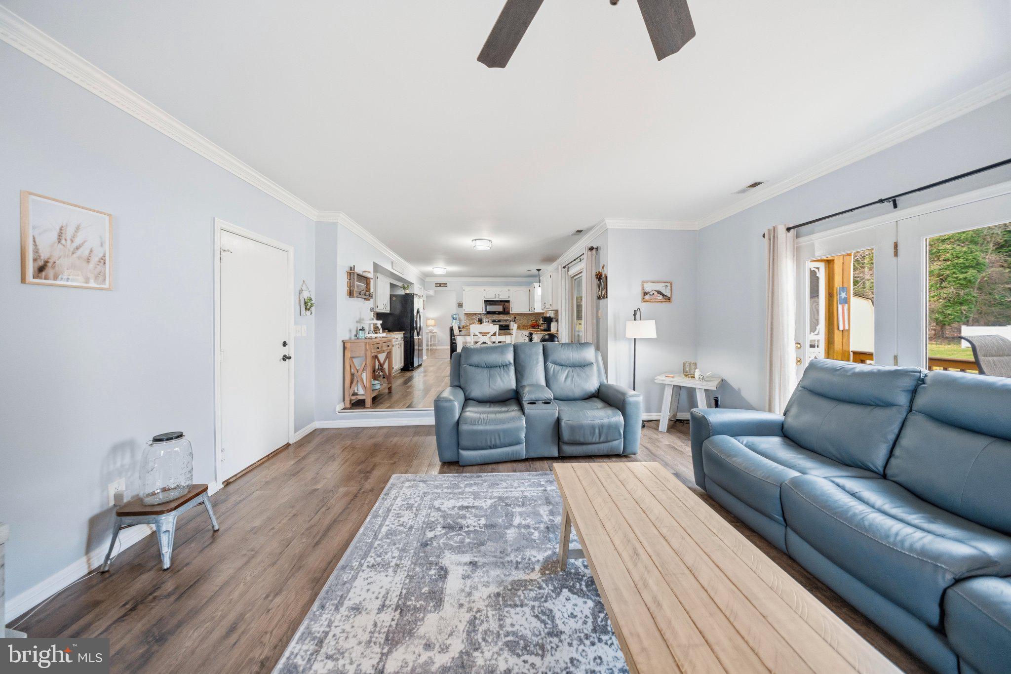 1221 Cedar Lane Edgewater, MD 21037 - Photo 21 of 58 a living room with furniture and a couch