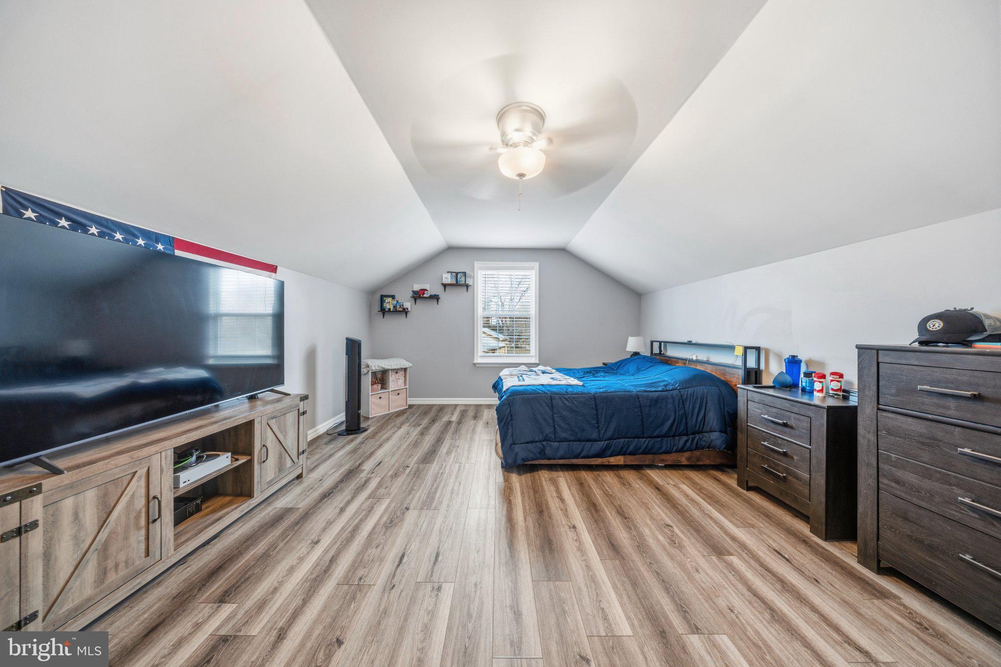 1221 Cedar Lane Edgewater, MD 21037 - Photo 25 of 58 a bedroom with furniture and flat screen tv