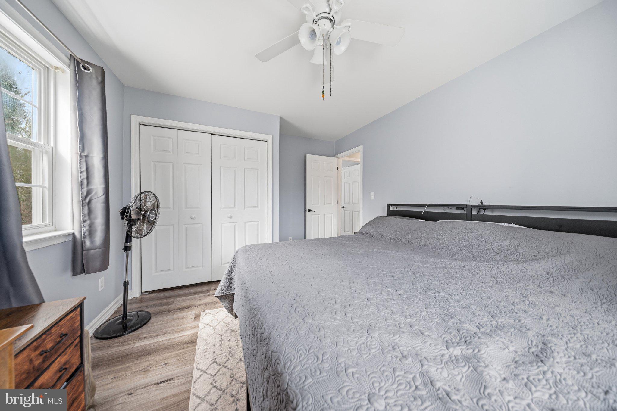 1221 Cedar Lane Edgewater, MD 21037 - Photo 30 of 58 a bedroom with a bed and a window