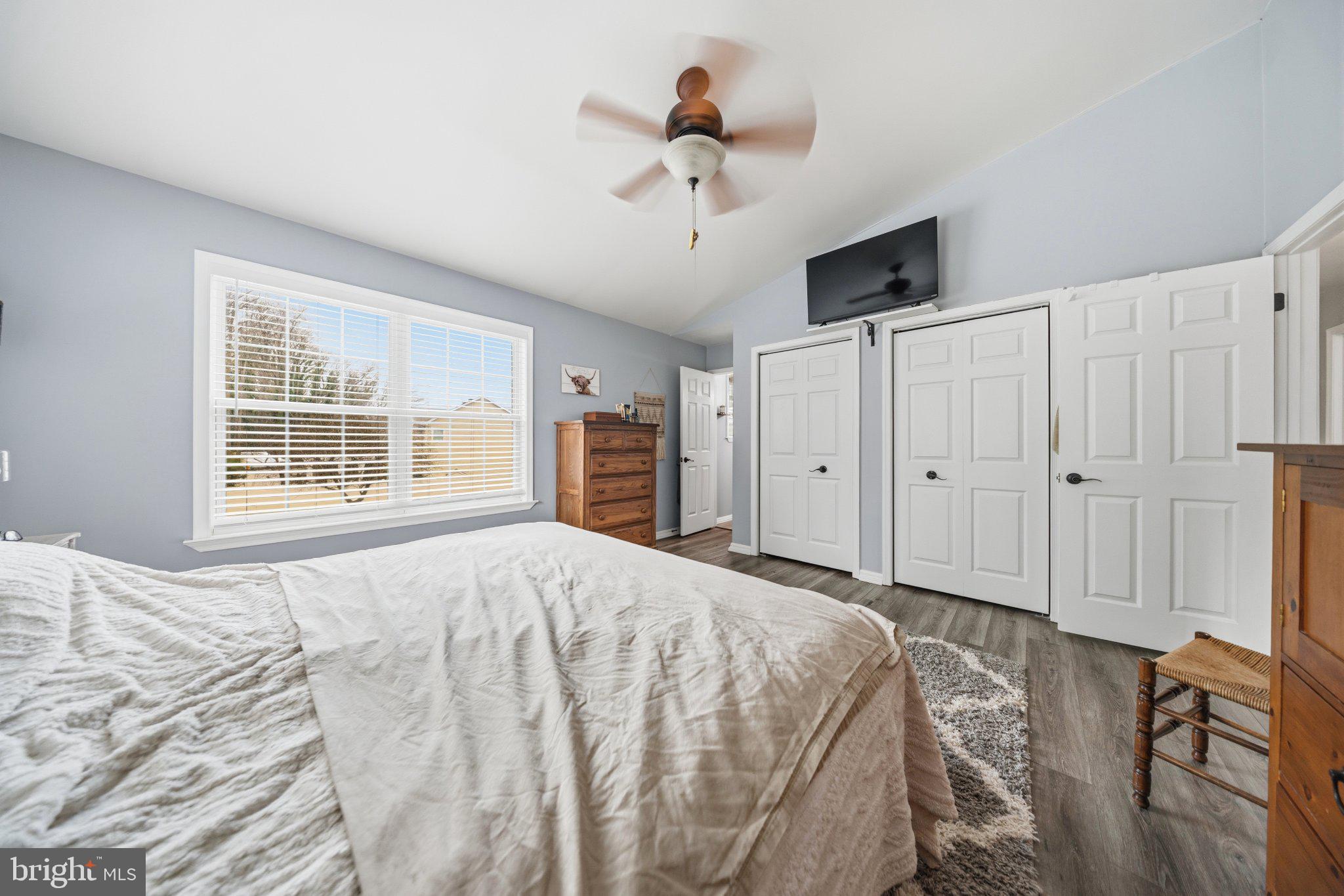1221 Cedar Lane Edgewater, MD 21037 - Photo 33 of 58 a bed room with a bed and a chandelier
