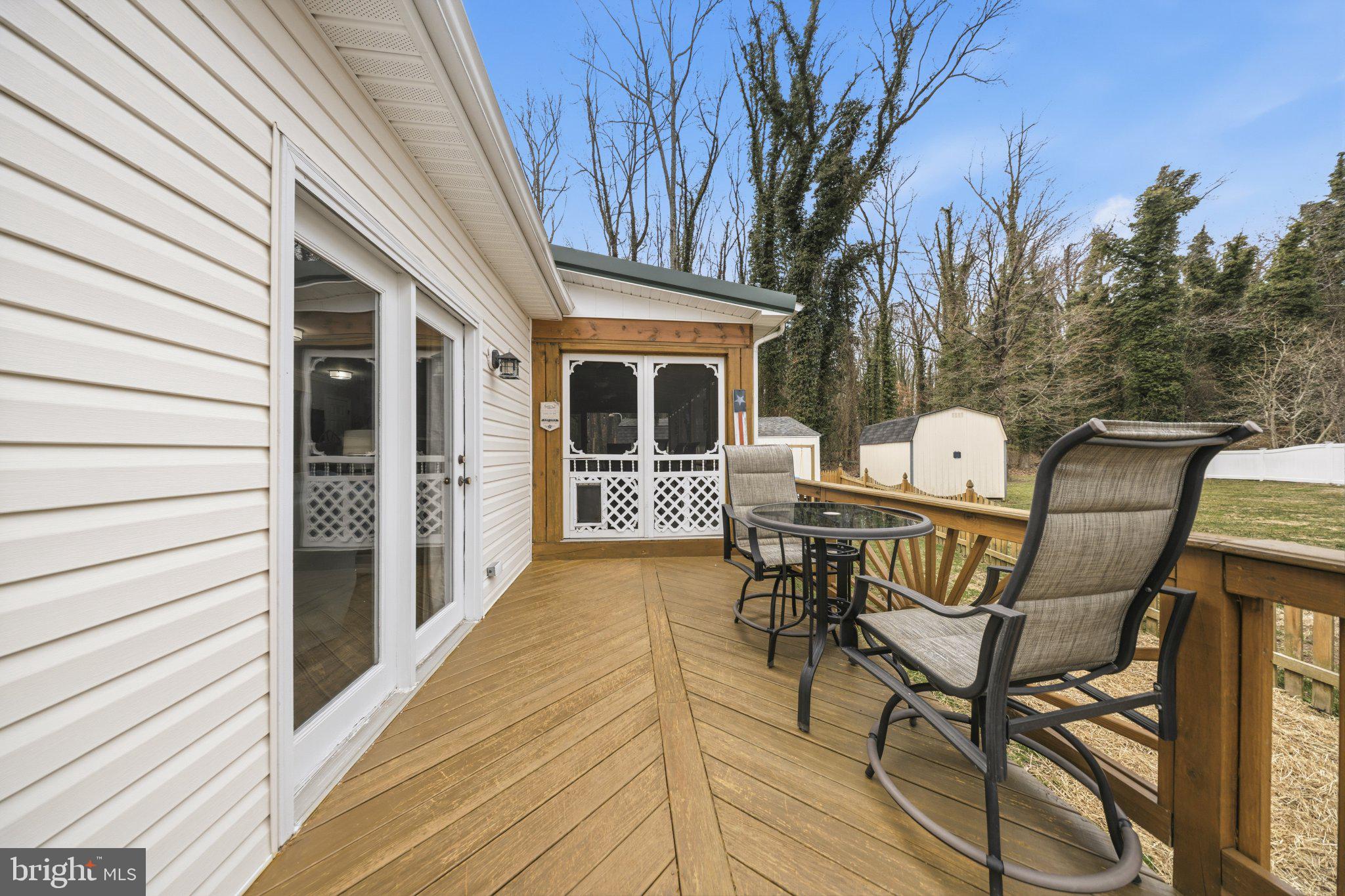 1221 Cedar Lane Edgewater, MD 21037 - Photo 45 of 58 a view of a chairs and table on the balcony