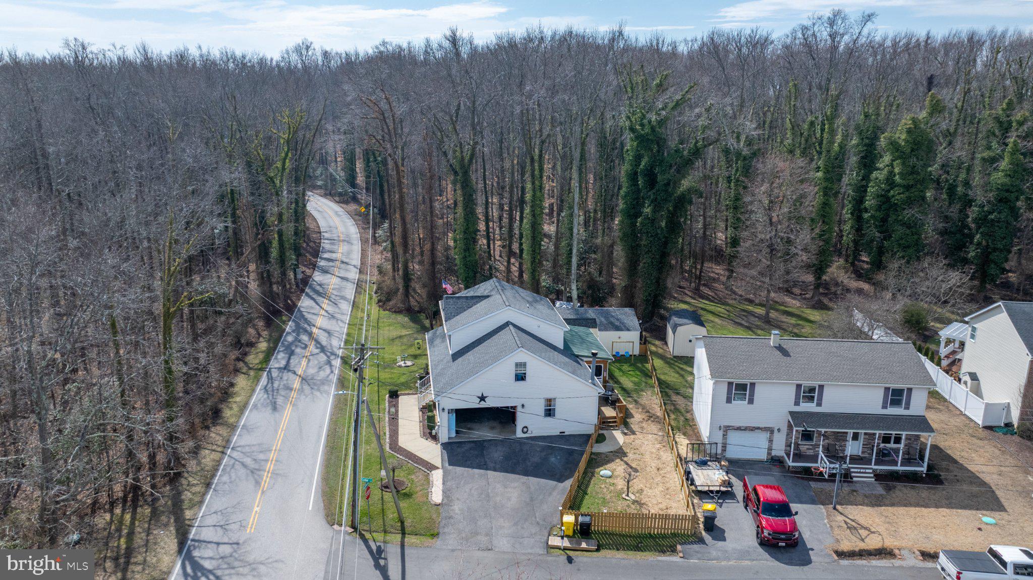 1221 Cedar Lane Edgewater, MD 21037 - Photo 51 of 58 a picture of houses with lots of trees