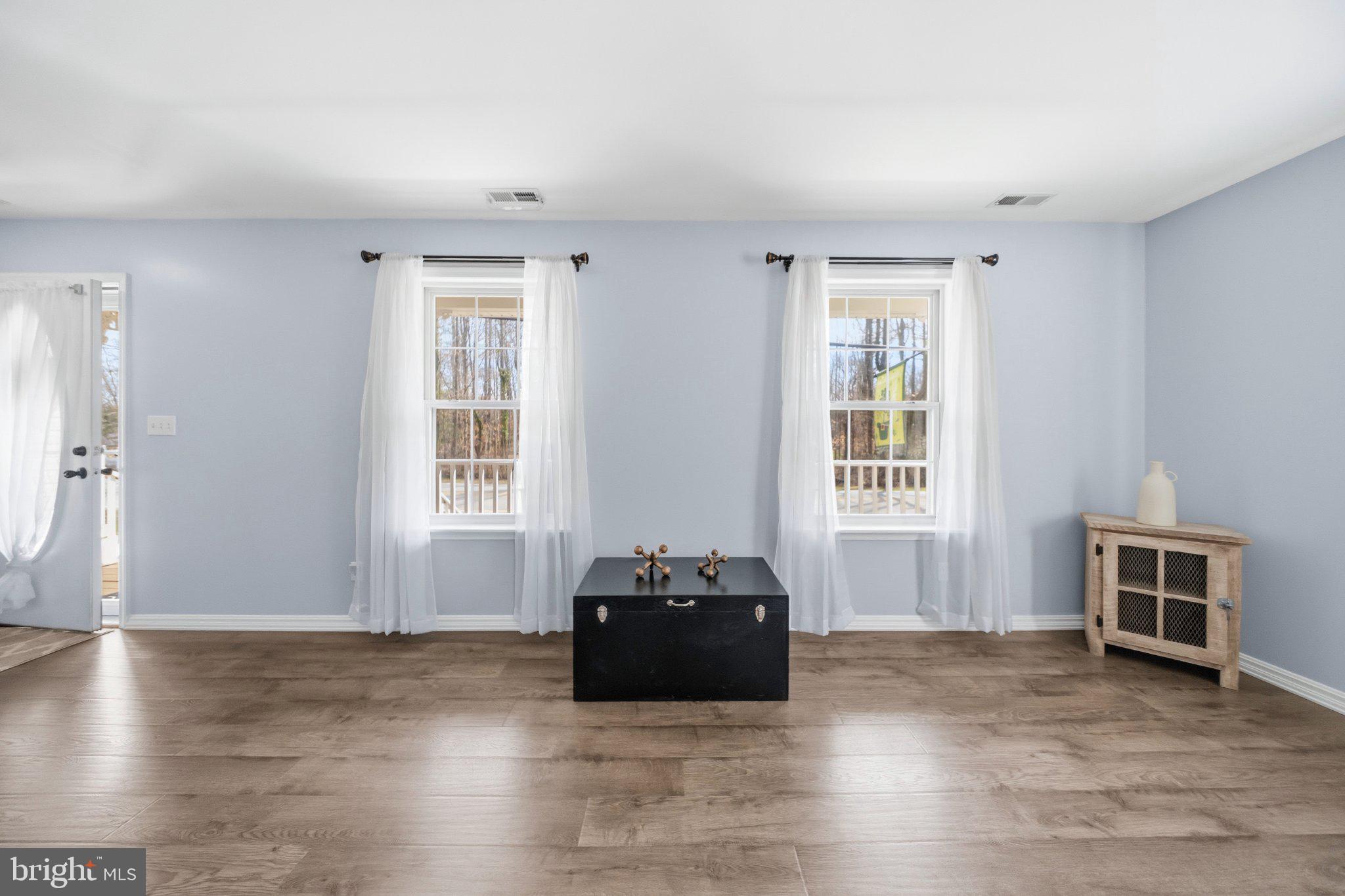 1221 Cedar Lane Edgewater, MD 21037 - Photo 9 of 58 a living room with furniture window and wooden floor