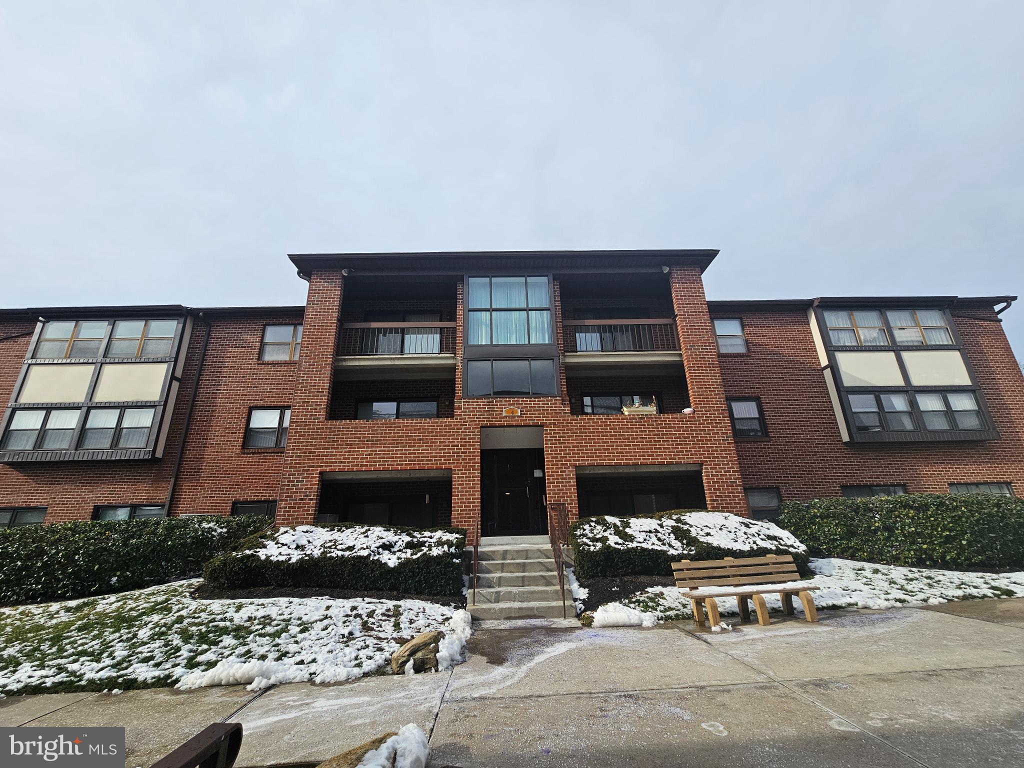 Charming brick apartment with winter's touch.