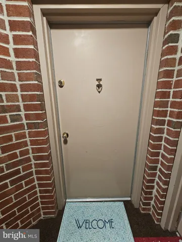 a view of bathroom with sink and shower