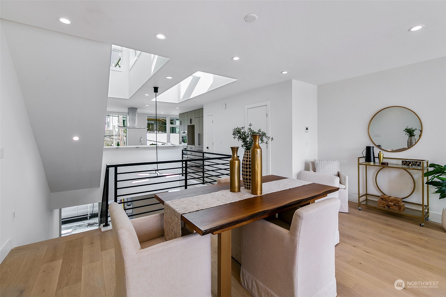 509 Galer Street Seattle, WA 98109 - Photo 12 of 40 a kitchen with a table and chairs