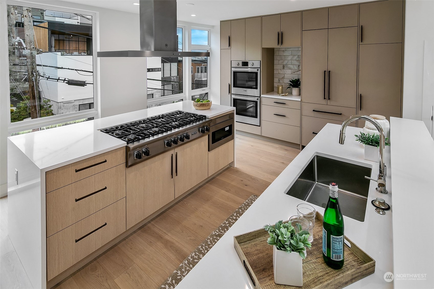 509 Galer Street Seattle, WA 98109 - Photo 13 of 40 a kitchen with a stove and a refrigerator