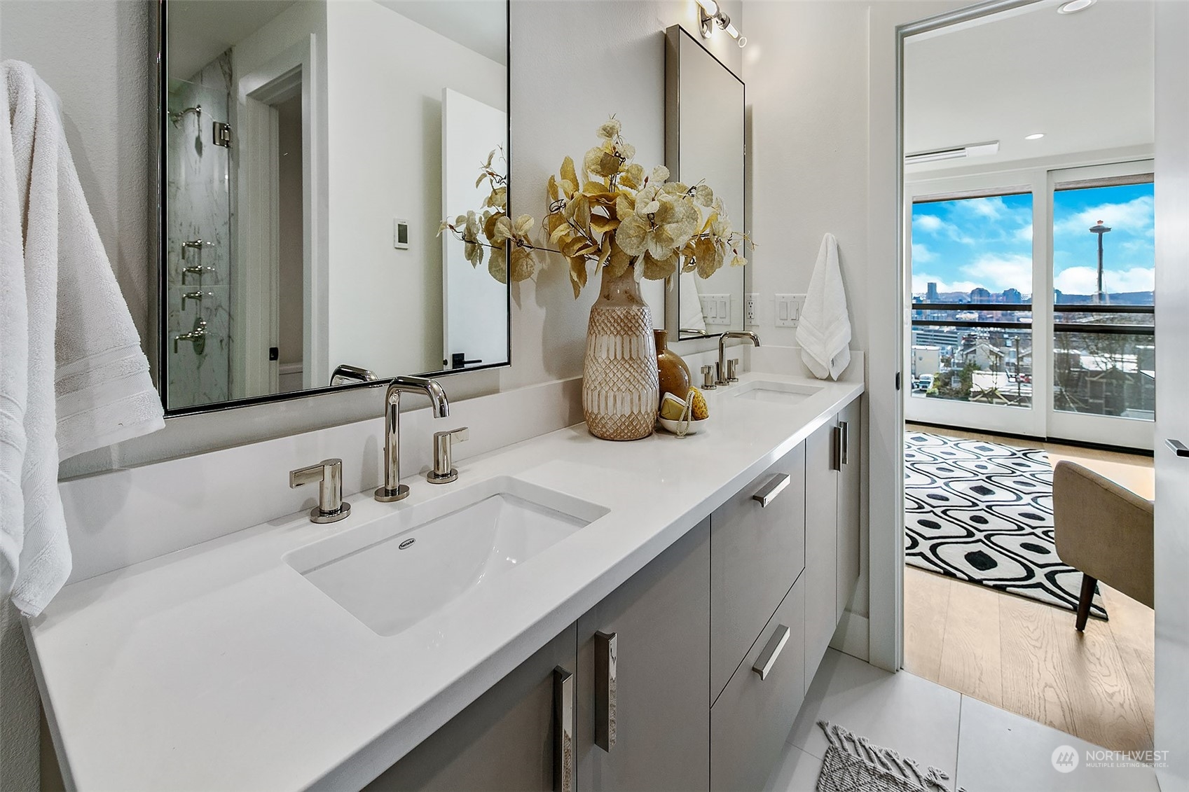 509 Galer Street Seattle, WA 98109 - Photo 27 of 40 a bathroom with a sink and a mirror