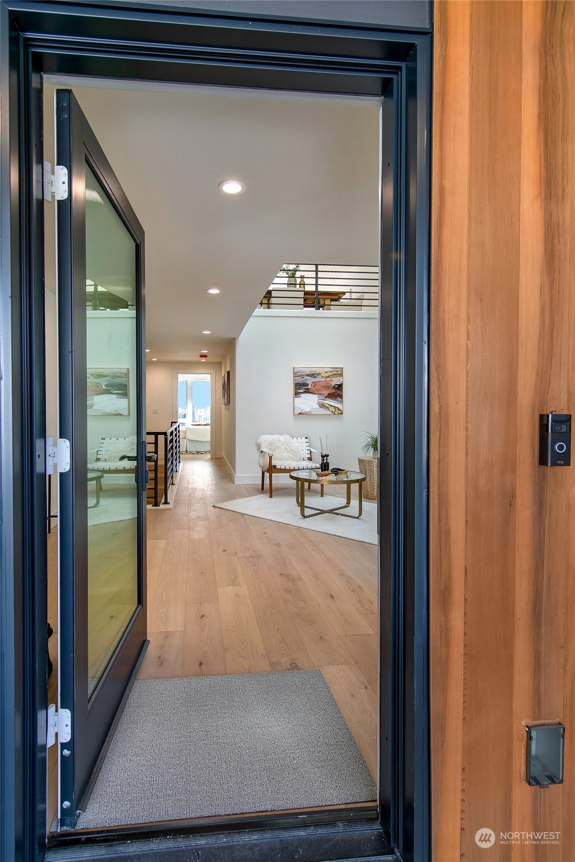 509 Galer Street Seattle, WA 98109 - Photo 3 of 40 a view of a hallway with a living room