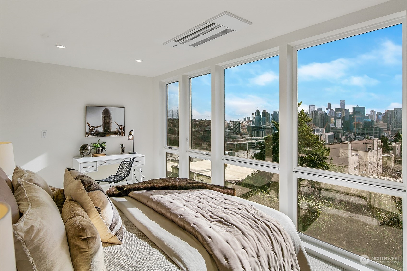 509 Galer Street Seattle, WA 98109 - Photo 31 of 40 a bedroom with a bed and a large window with the balcony view