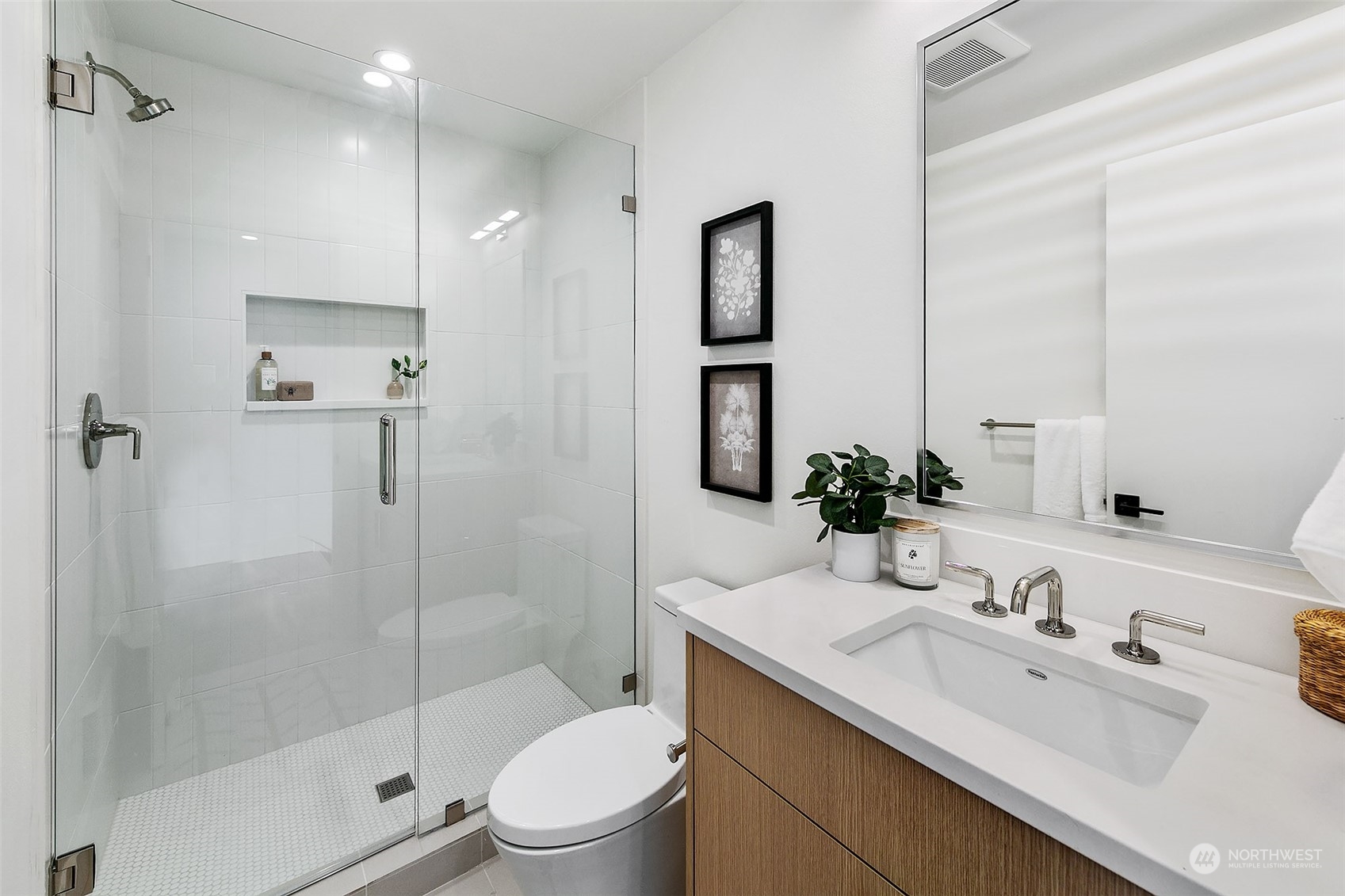 509 Galer Street Seattle, WA 98109 - Photo 32 of 40 a bathroom with a sink toilet and shower
