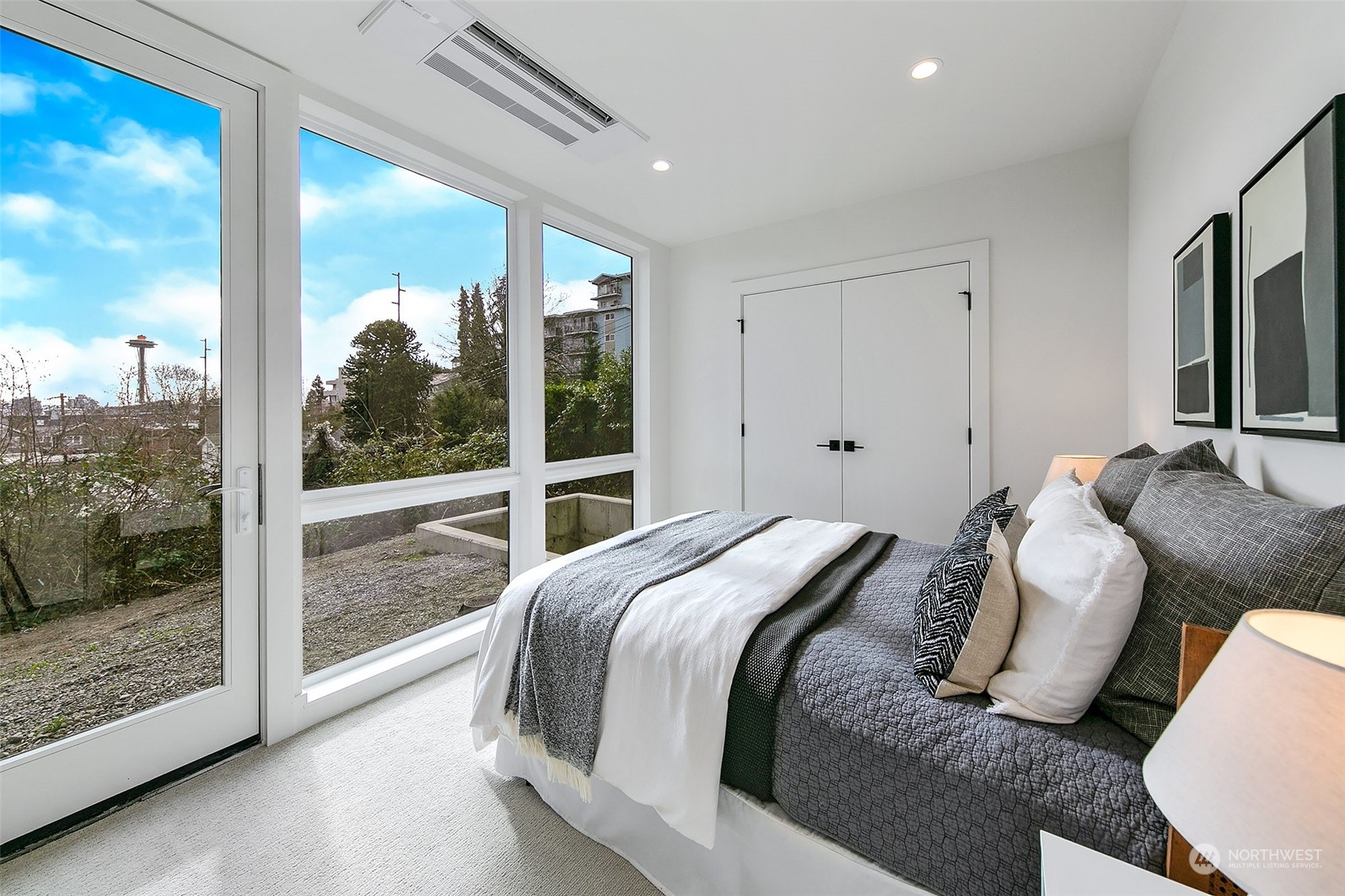 509 Galer Street Seattle, WA 98109 - Photo 35 of 40 a bed room with bed and a large window