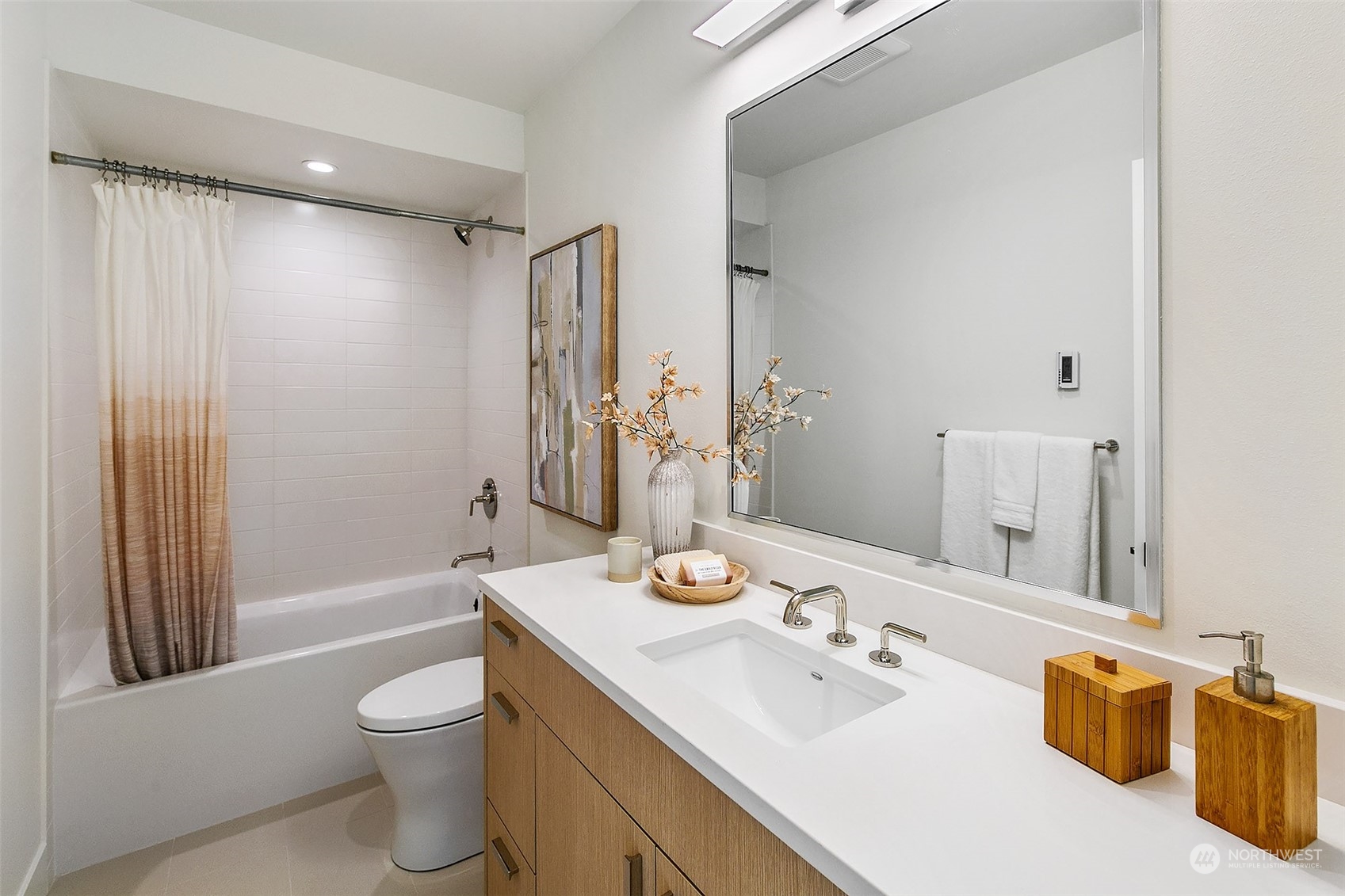 509 Galer Street Seattle, WA 98109 - Photo 37 of 40 a bathroom with a sink a toilet and shower