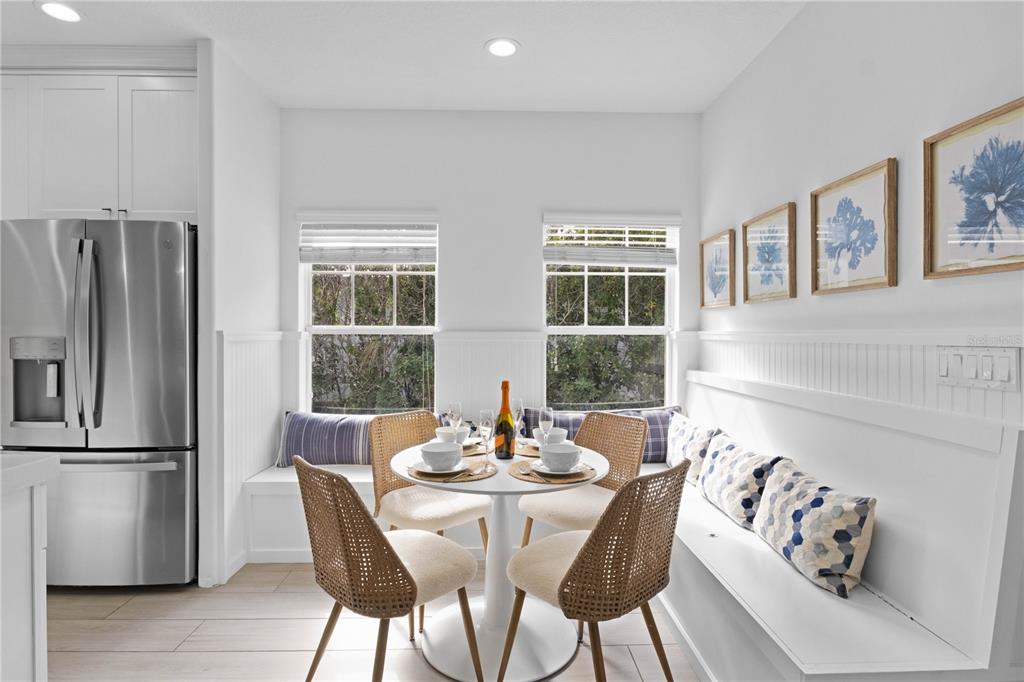 307 Spring Avenue Anna Maria, FL 34216 - Photo 11 of 51 a view of a dining room with furniture window and outside view