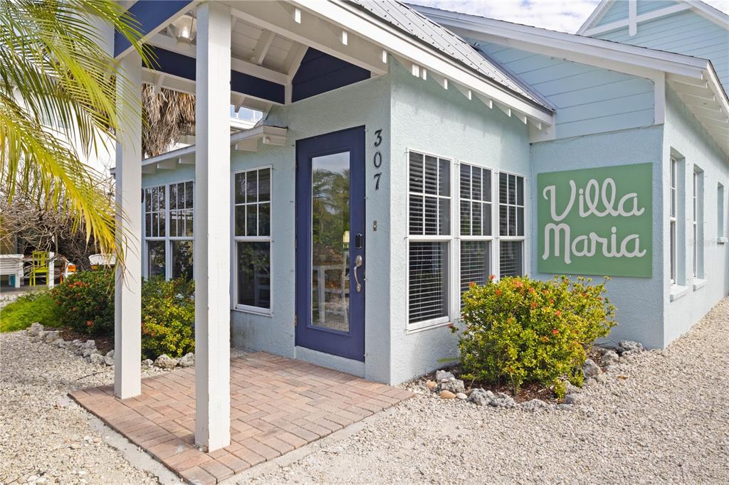 307 Spring Avenue Anna Maria, FL 34216 - Photo 2 of 51 a view of a entryway door front of house