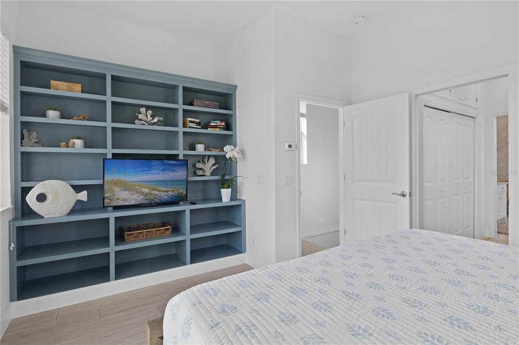 307 Spring Avenue Anna Maria, FL 34216 - Photo 28 of 51 a bedroom with a bed and closet