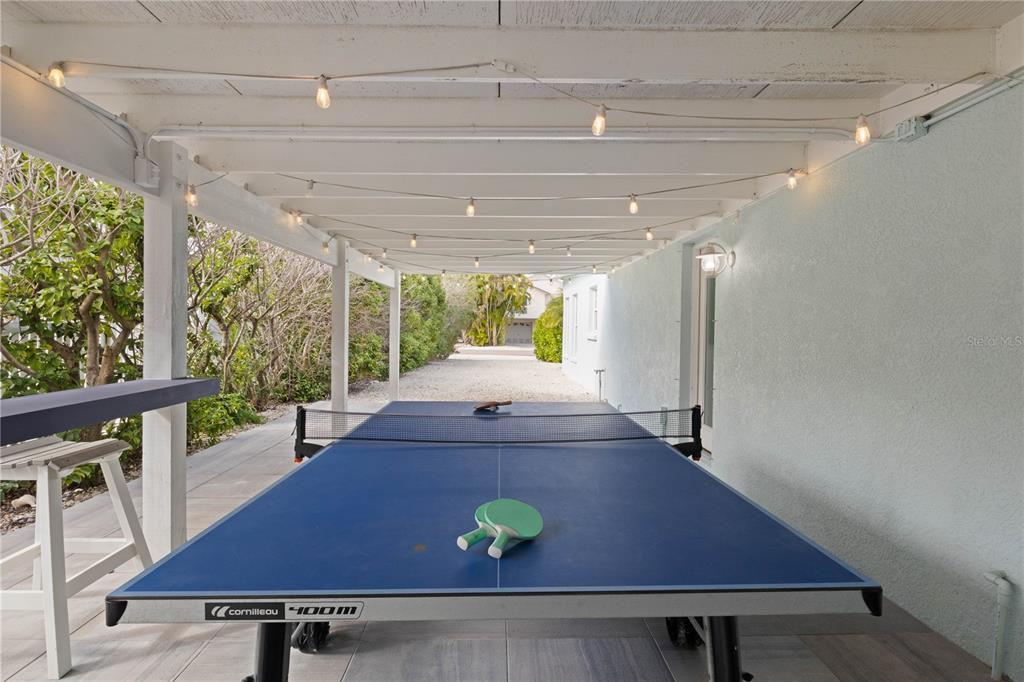 307 Spring Avenue Anna Maria, FL 34216 - Photo 36 of 51 a view of a room with furniture and a table
