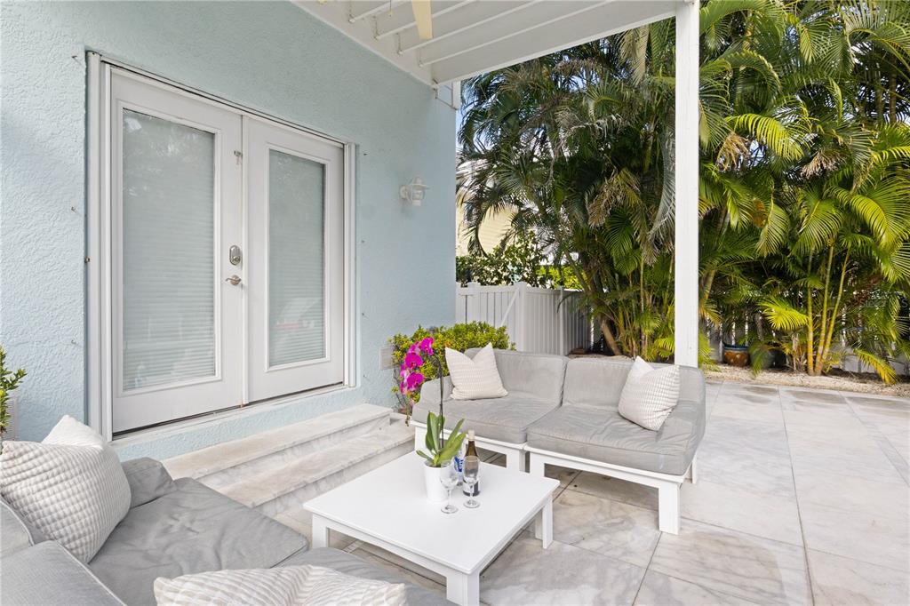 307 Spring Avenue Anna Maria, FL 34216 - Photo 41 of 51 a living room with furniture and a window