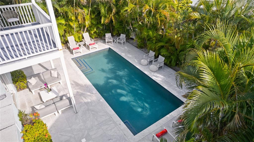 307 Spring Avenue Anna Maria, FL 34216 - Photo 47 of 51 a view of swimming pool with a yard