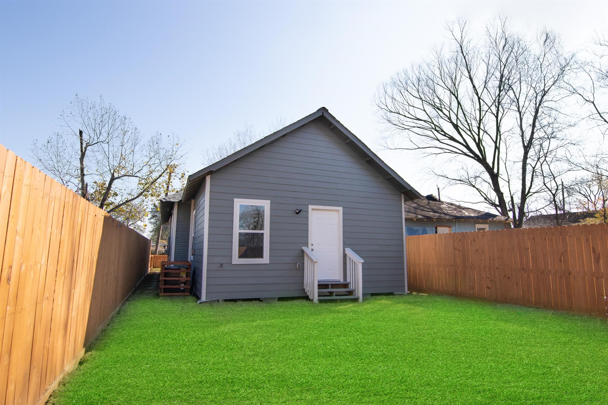 1709 Stevens Street Houston, TX 77026 - Photo 15 of 17 a view of a house with a backyard