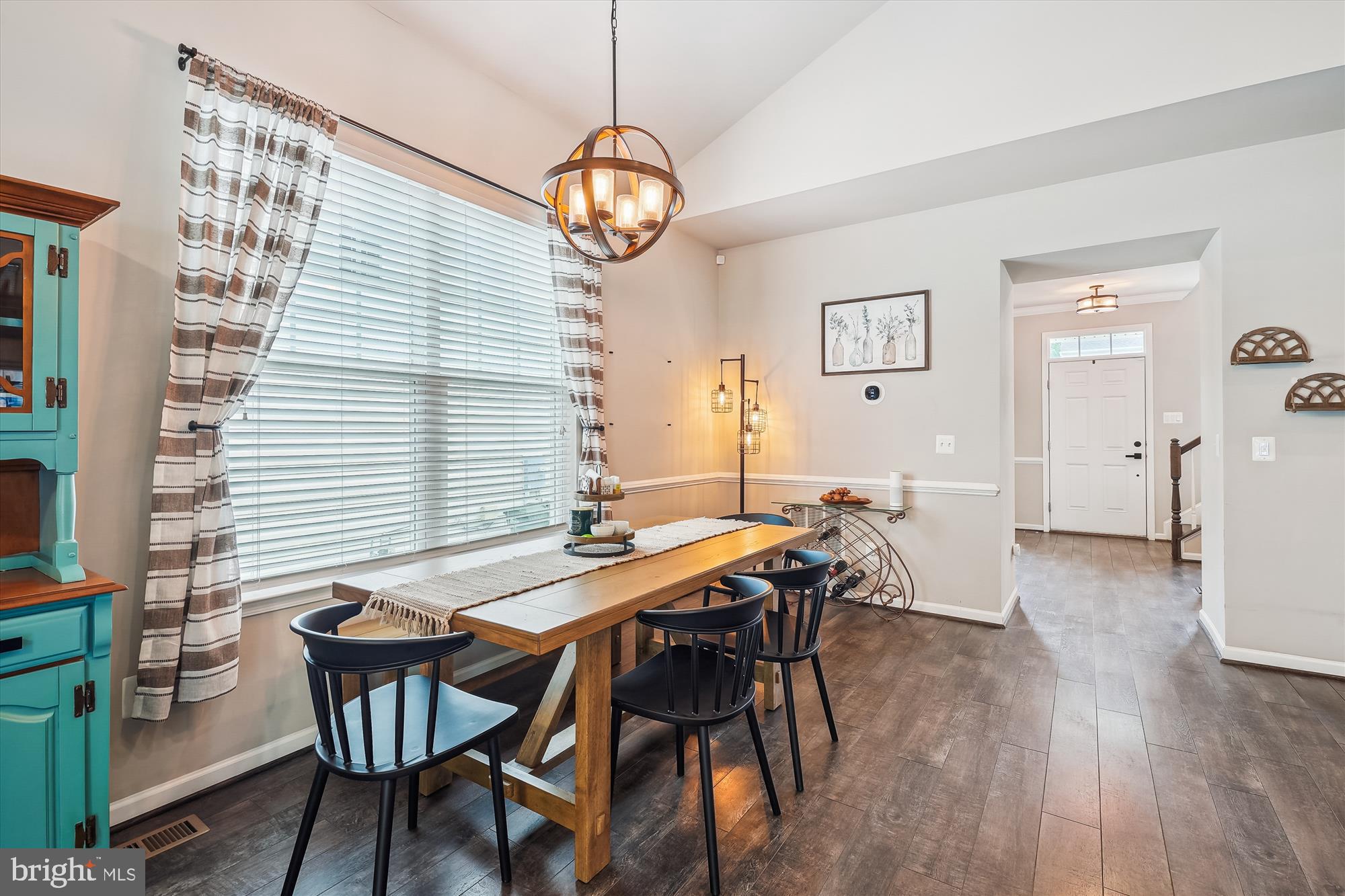 12141 Aster Road Bristow, VA 20136 - Photo 17 of 65 a view of a dining room with furniture and wooden floor