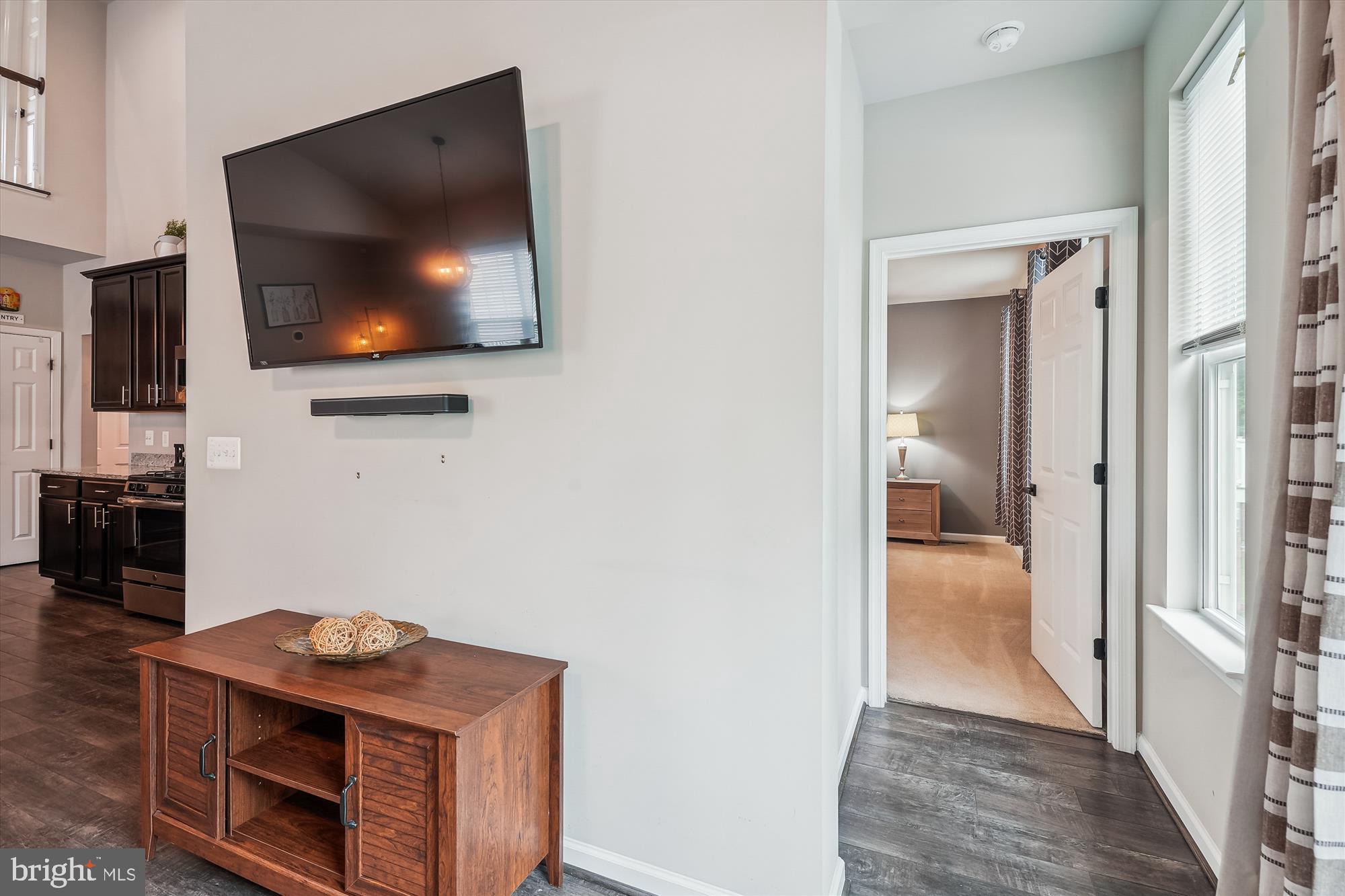 12141 Aster Road Bristow, VA 20136 - Photo 18 of 65 a living room with furniture and a flat screen tv