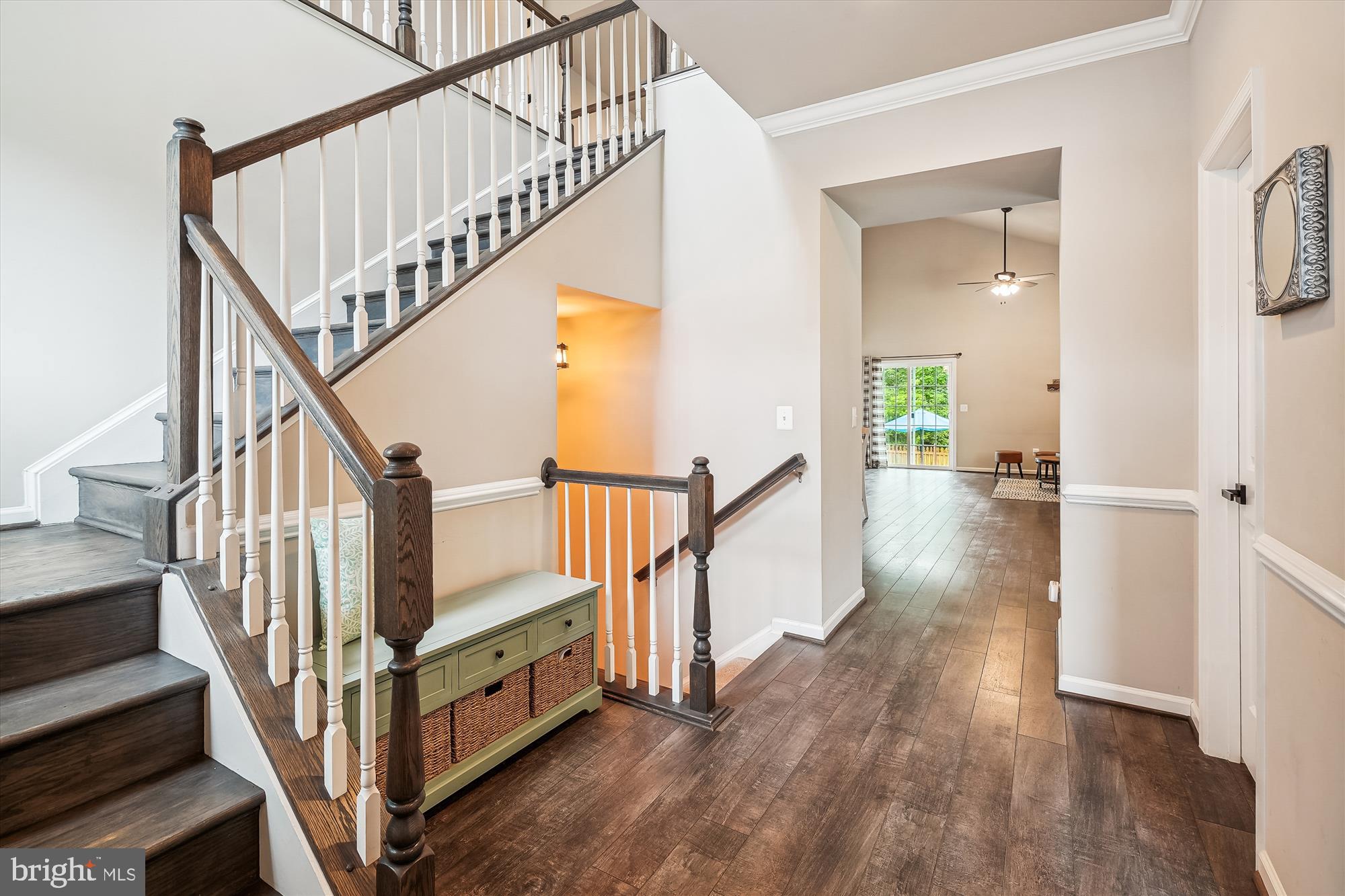 12141 Aster Road Bristow, VA 20136 - Photo 3 of 65 a view of an entryway with wooden floor and stairs