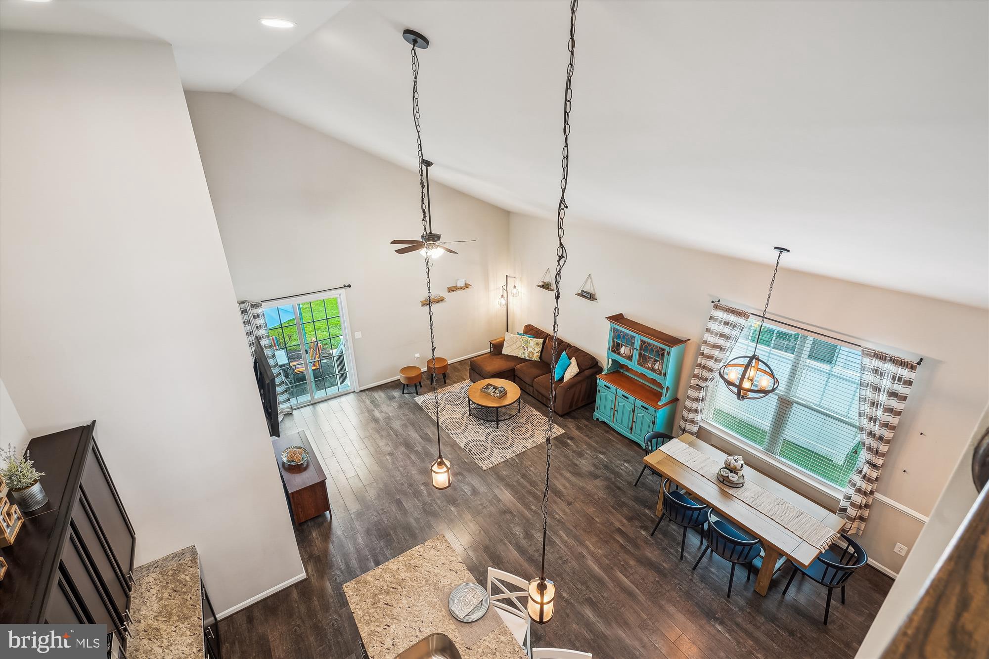 12141 Aster Road Bristow, VA 20136 - Photo 31 of 65 a living room with furniture and a wooden floor