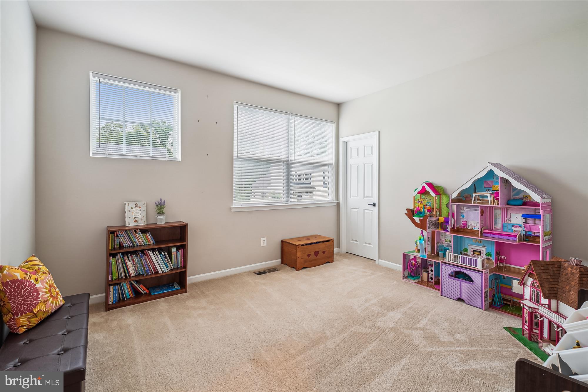 12141 Aster Road Bristow, VA 20136 - Photo 33 of 65 a bedroom with furniture and a book shelf