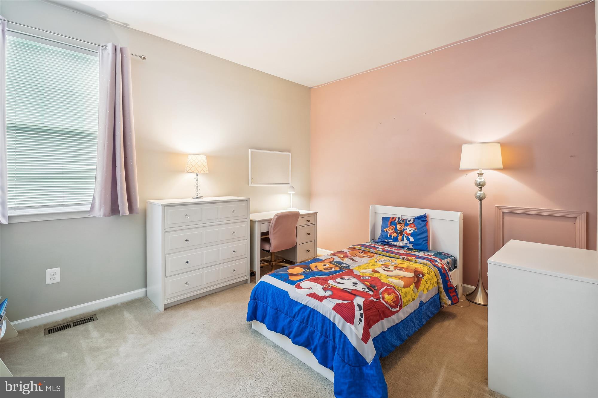 12141 Aster Road Bristow, VA 20136 - Photo 36 of 65 a bedroom with a bed and a lamp