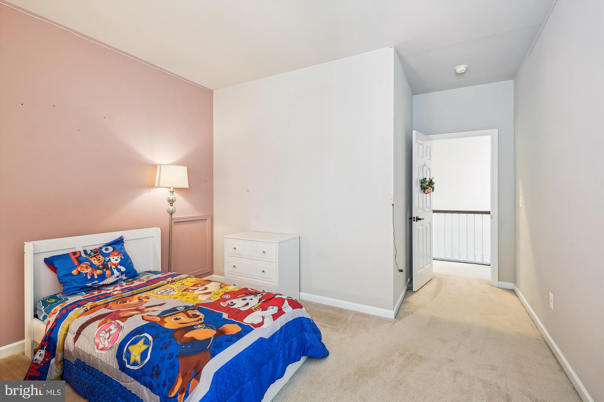 12141 Aster Road Bristow, VA 20136 - Photo 37 of 65 a bedroom with a bed and a lamp