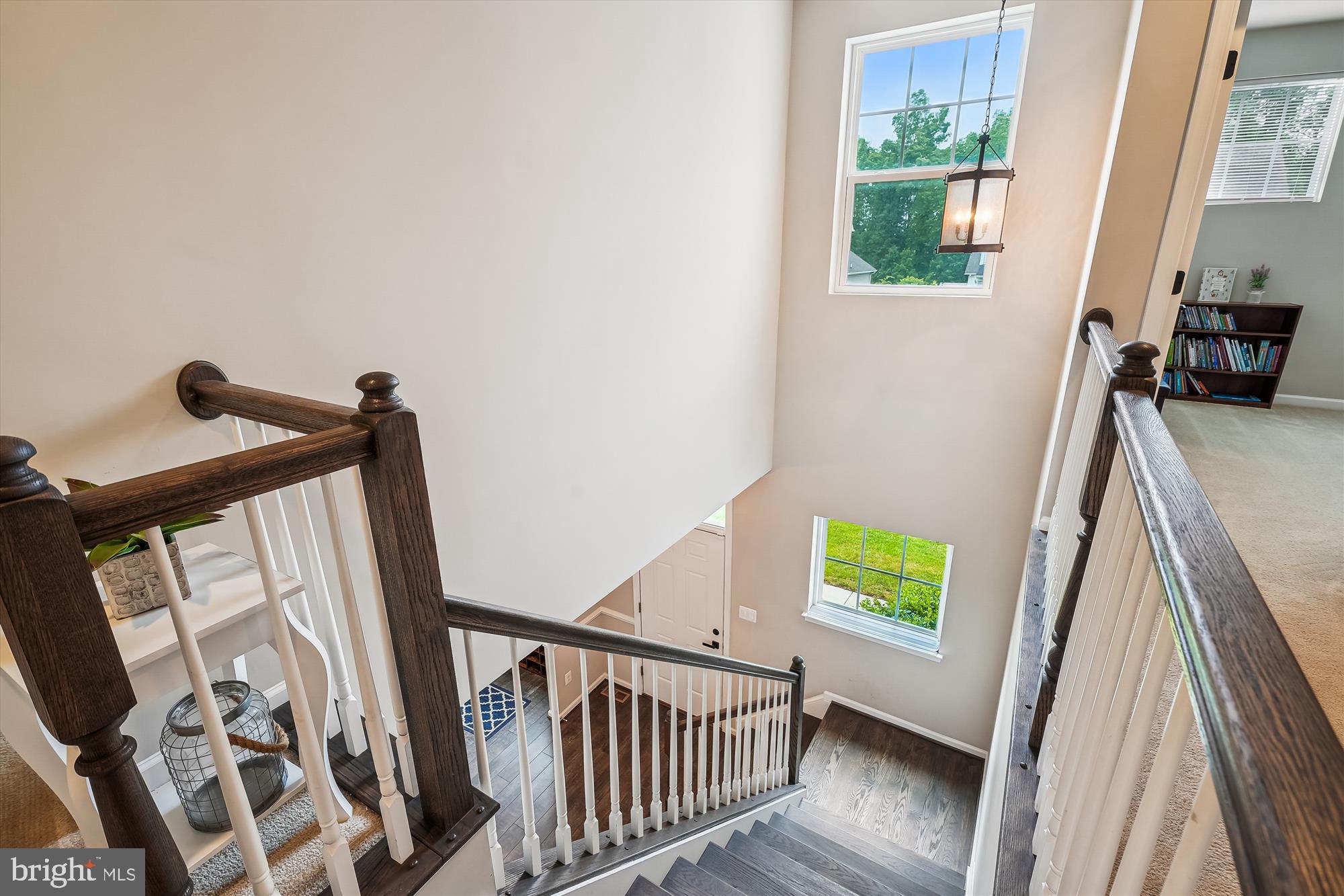 12141 Aster Road Bristow, VA 20136 - Photo 42 of 65 a view of stairs and with wooden floor