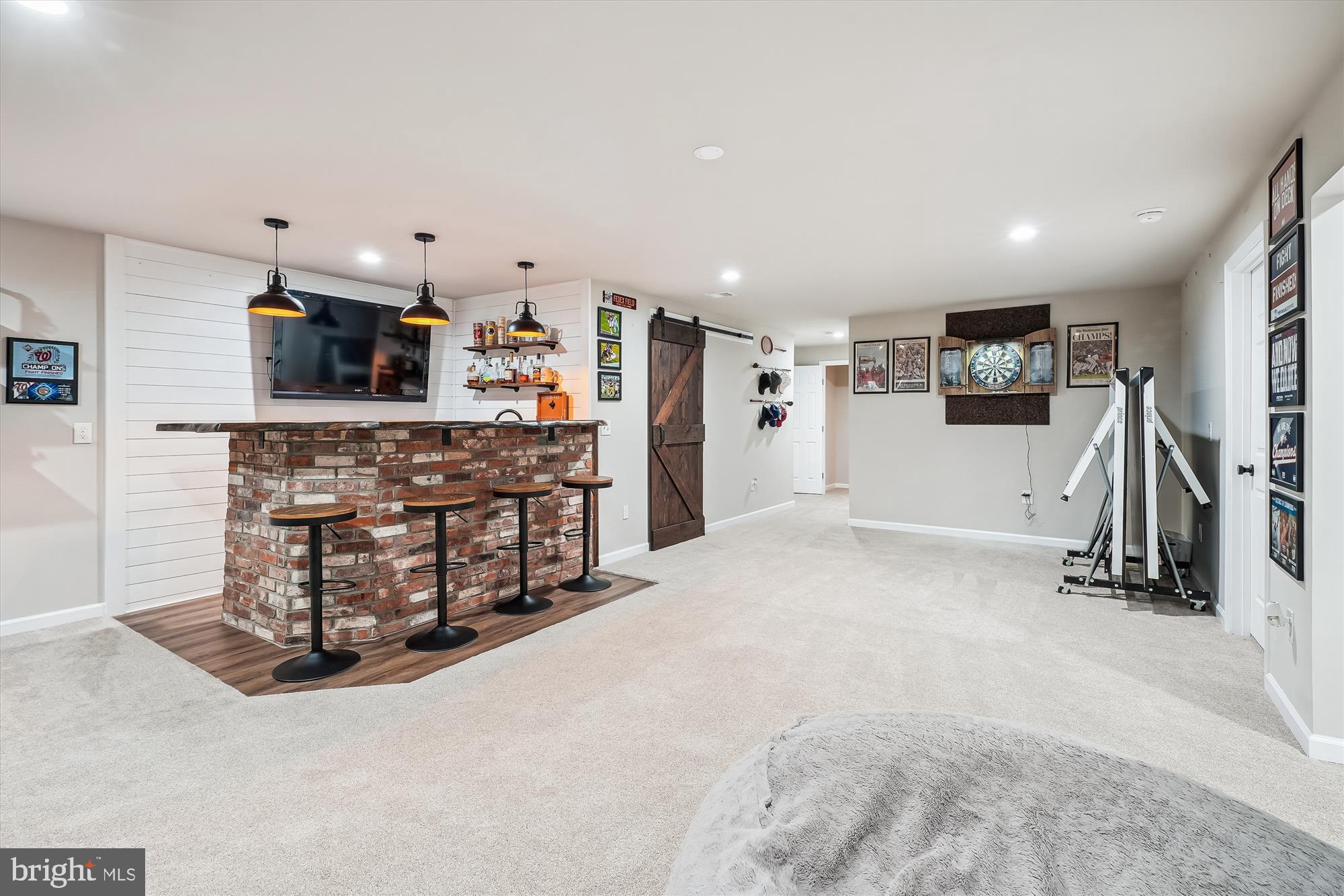 12141 Aster Road Bristow, VA 20136 - Photo 44 of 65 a view of a livingroom with furniture and a flat screen tv
