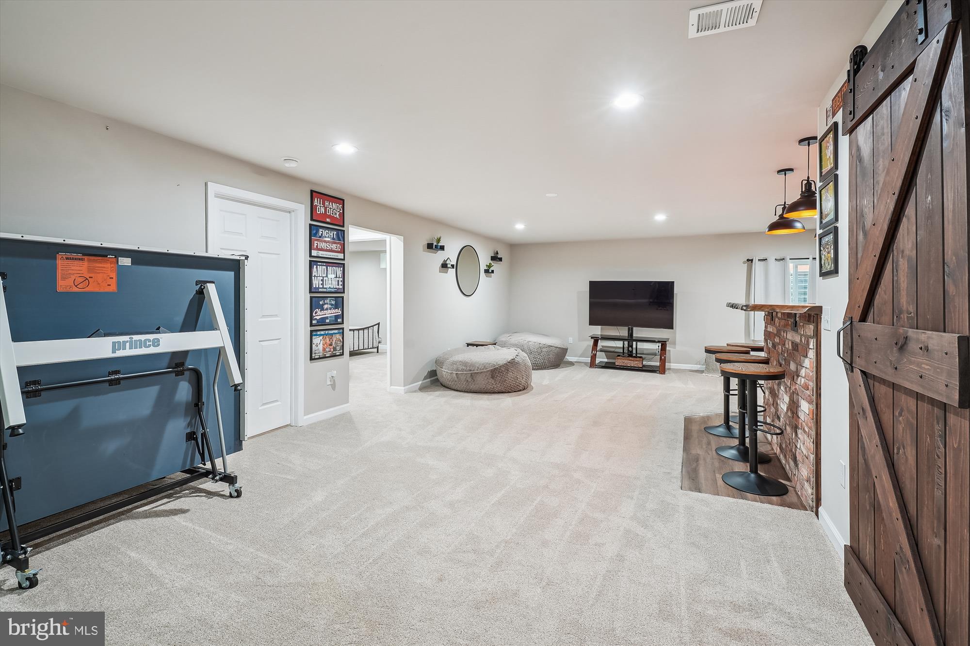 12141 Aster Road Bristow, VA 20136 - Photo 45 of 65 a view of a livingroom with furniture and fireplace