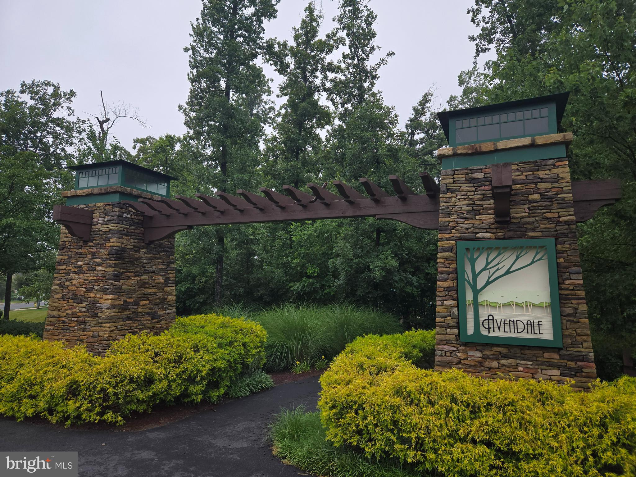 12141 Aster Road Bristow, VA 20136 - Photo 57 of 65 a backyard of a house with lots of green space