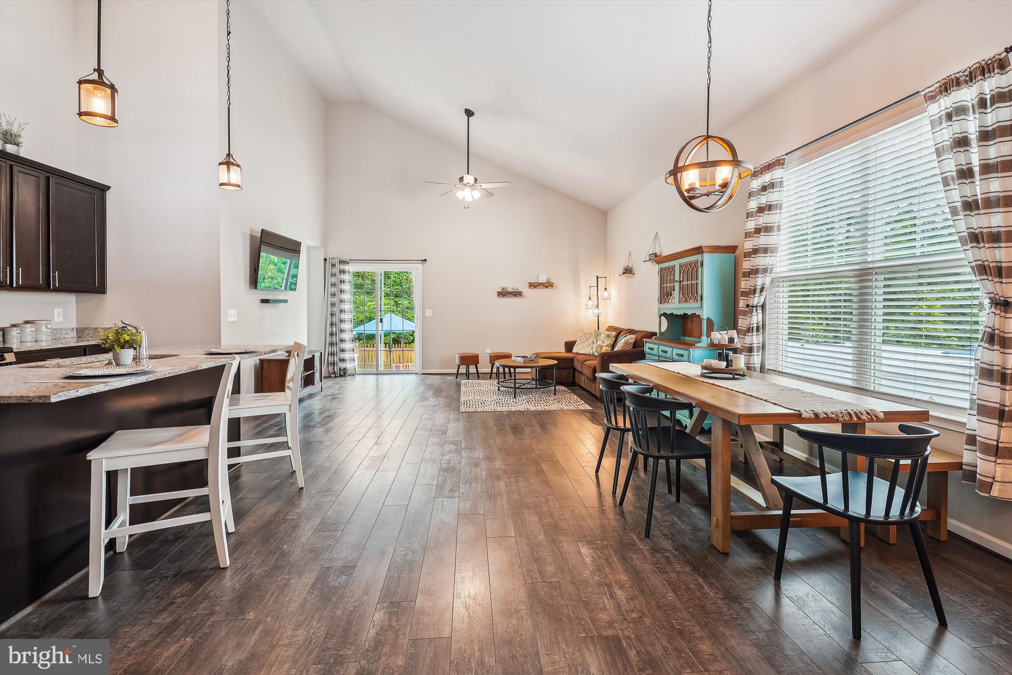 12141 Aster Road Bristow, VA 20136 - Photo 7 of 65 a view of a dining area with furniture window and wooden floor