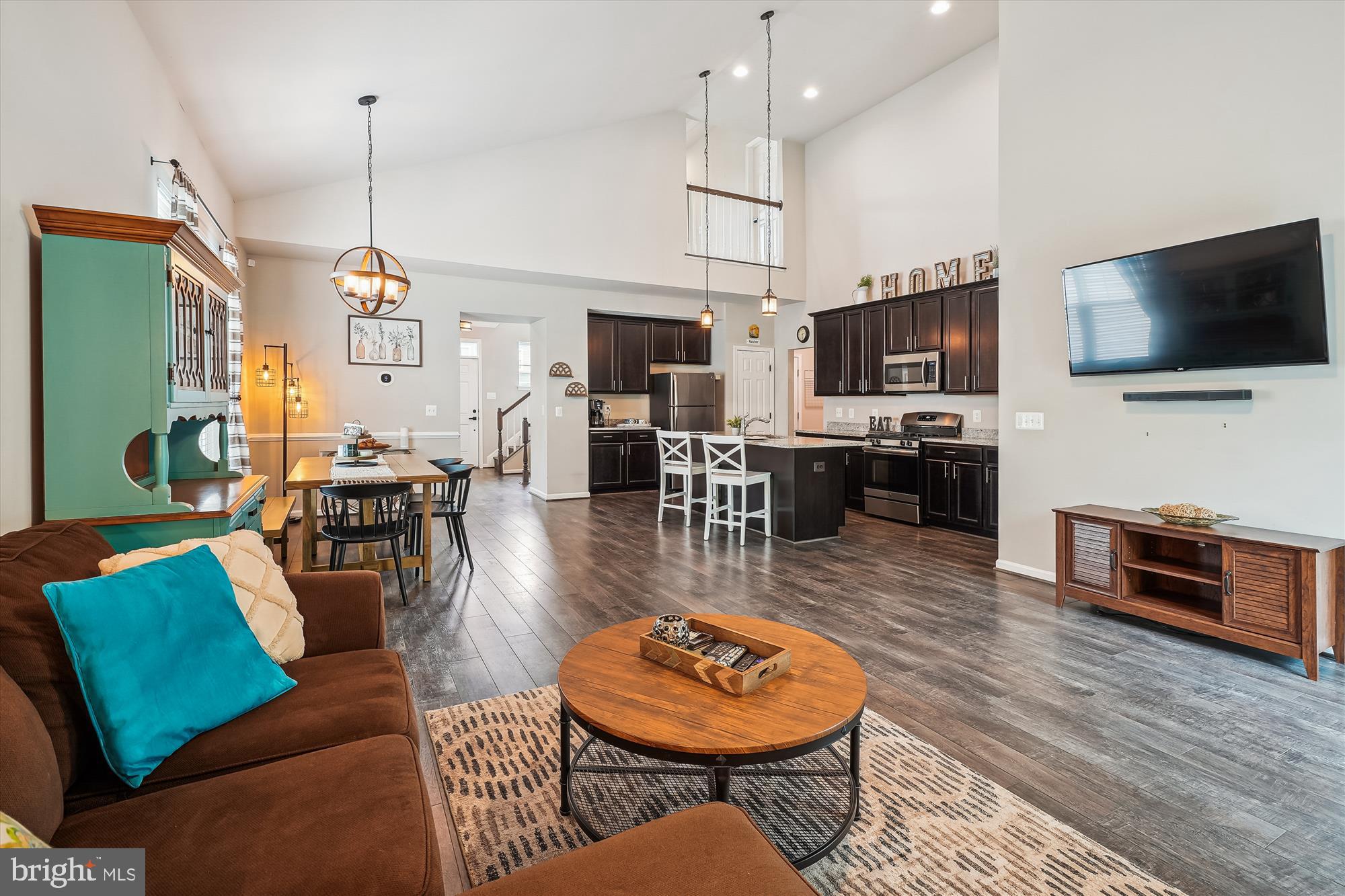 12141 Aster Road Bristow, VA 20136 - Photo 8 of 65 a living room with furniture and a flat screen tv