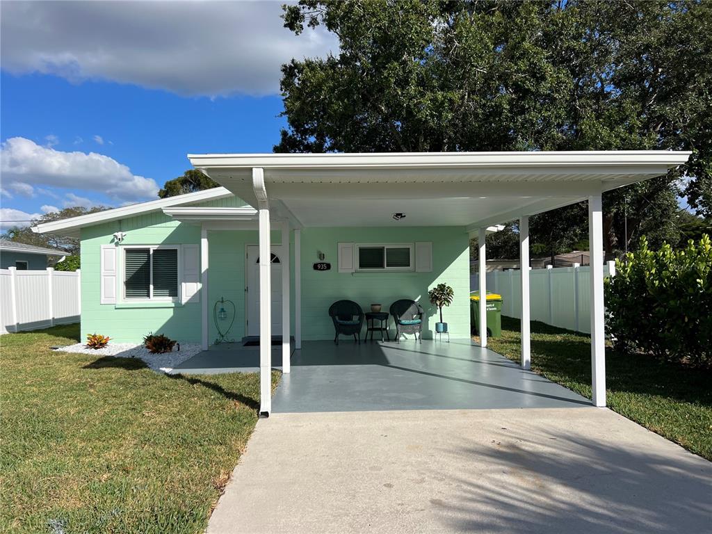 935 Rhodes Avenue Sarasota, FL 34237 - Photo 1 of 1 a view of a house with porch