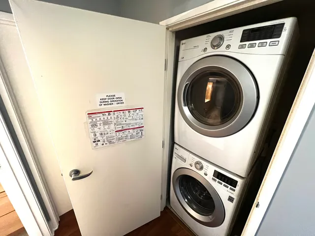 a bathroom with a double vanity sink and mirror