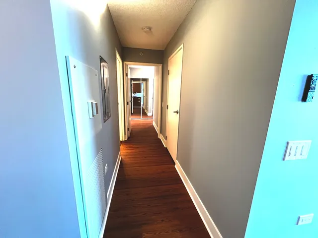 a bathroom with a double vanity sink and mirror