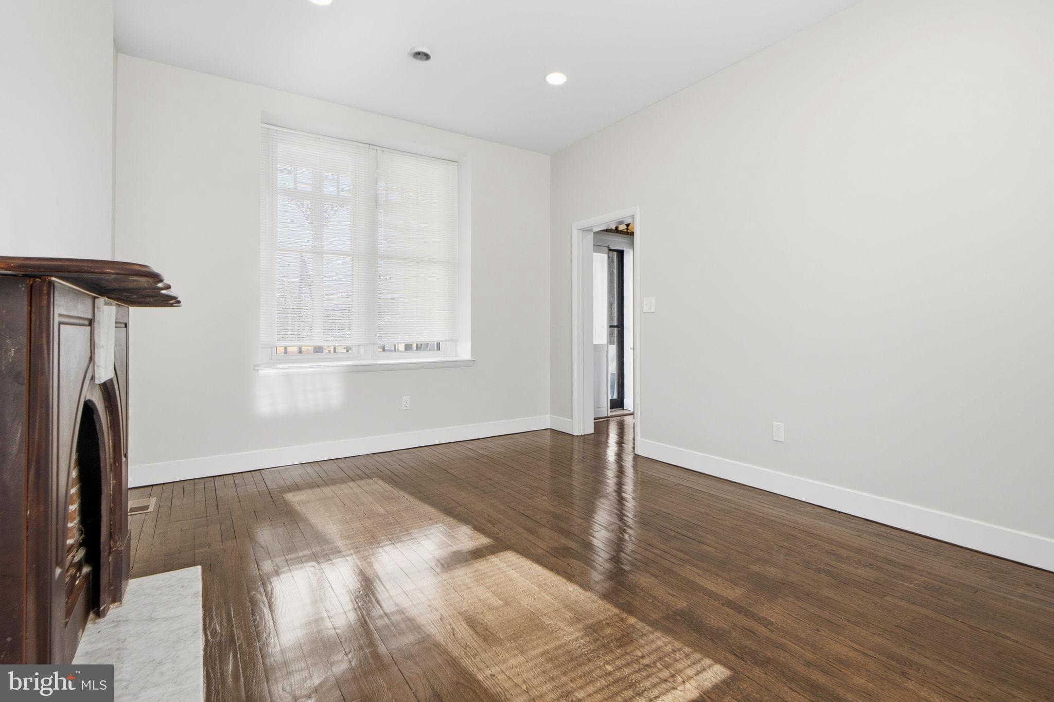 317 East Patapsco Avenue Baltimore, MD 21225 - Photo 14 of 36 Bright and airy space with classic charm.
