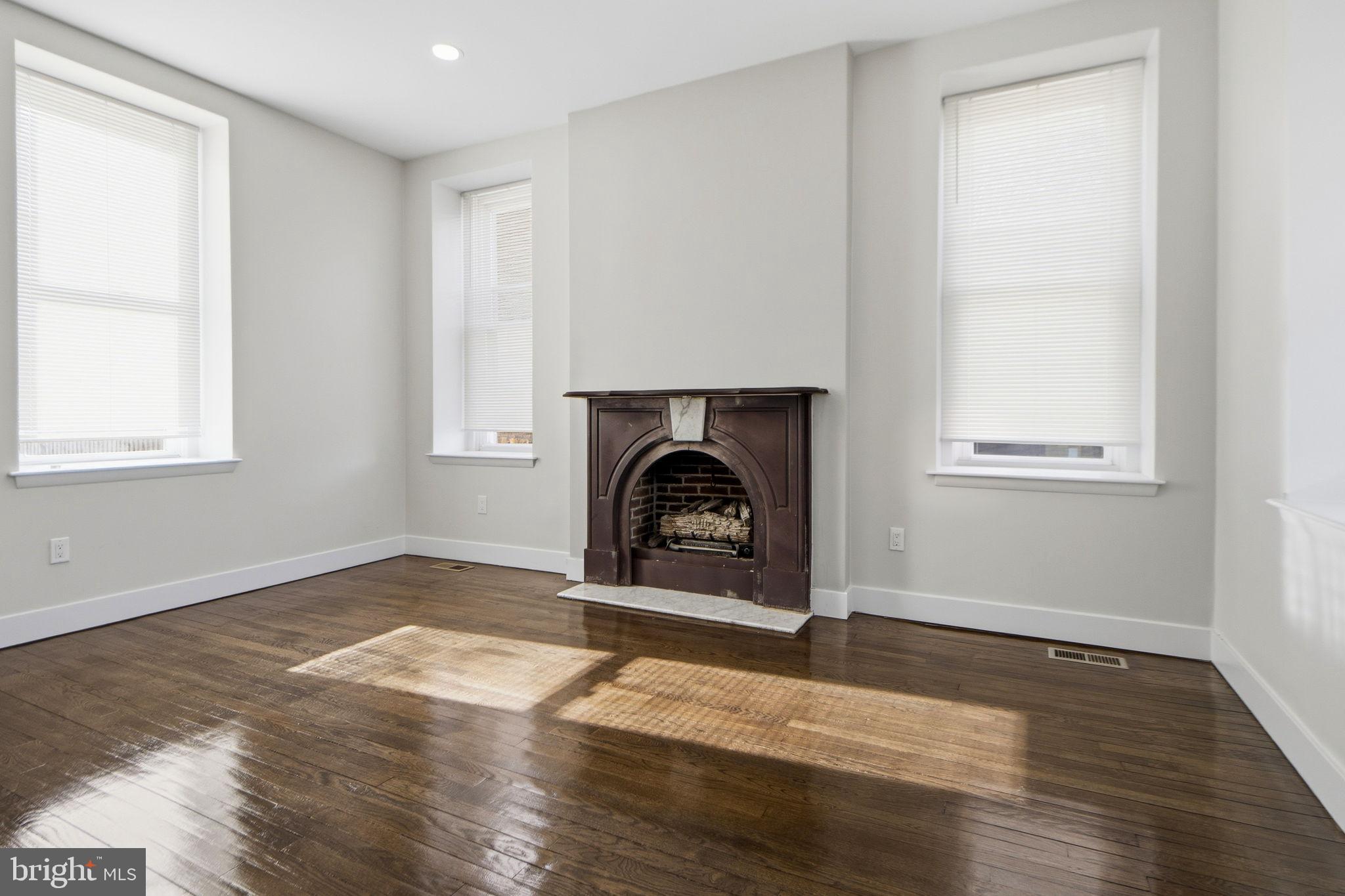 317 East Patapsco Avenue Baltimore, MD 21225 - Photo 16 of 36 Bright, airy space with classic charm.