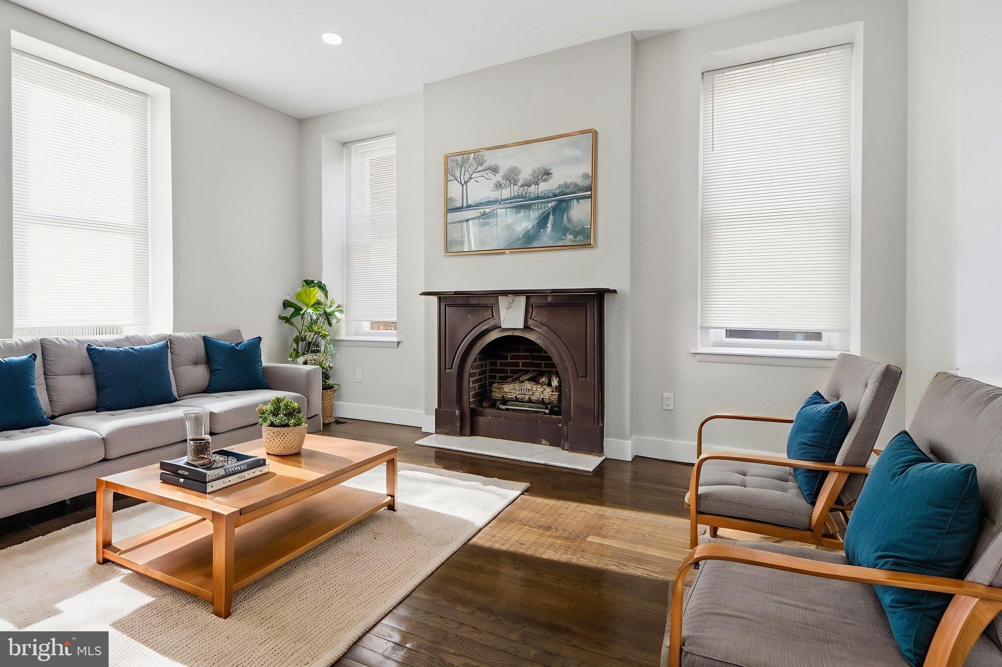 317 East Patapsco Avenue Baltimore, MD 21225 - Photo 17 of 36 Bright and inviting living space, virtually space