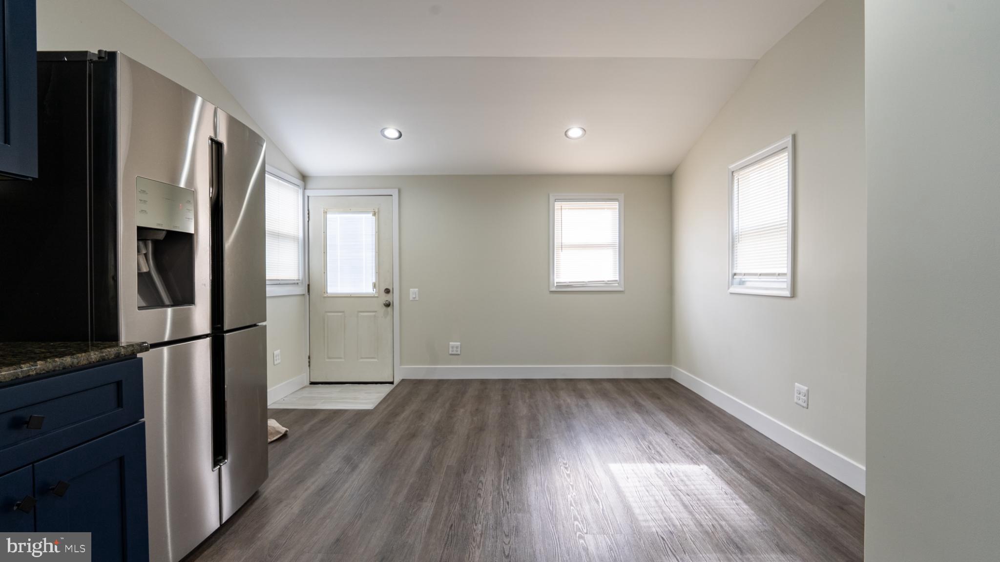 317 East Patapsco Avenue Baltimore, MD 21225 - Photo 22 of 36 Bright and airy kitchen with modern finishes.