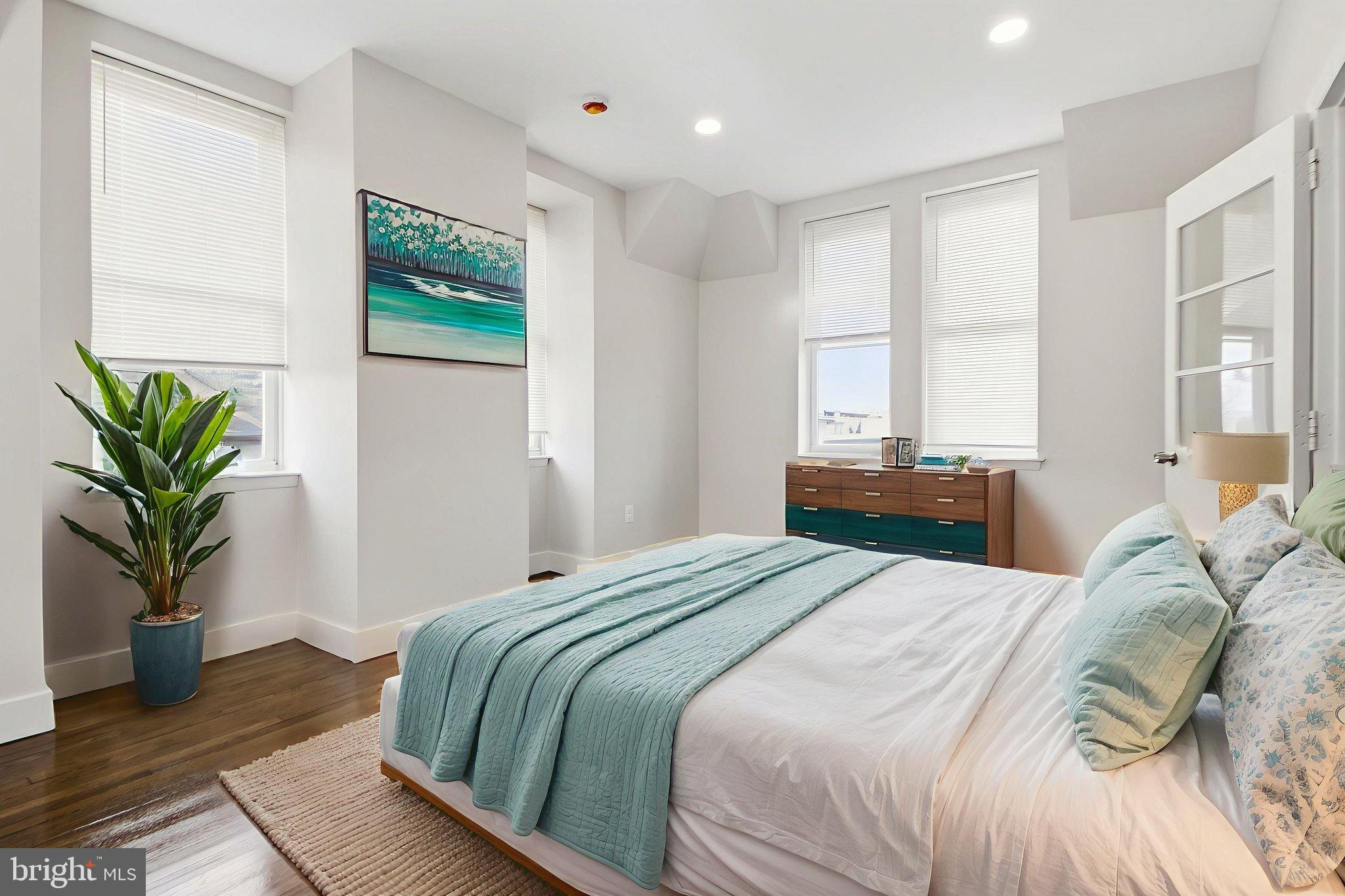 317 East Patapsco Avenue Baltimore, MD 21225 - Photo 29 of 36 Bright, airy bedroom or office, virtually staged