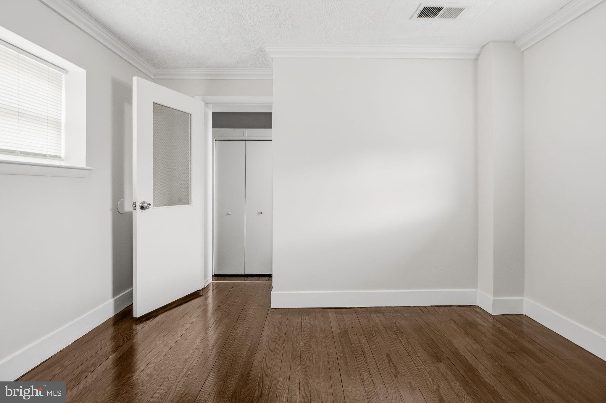 317 East Patapsco Avenue Baltimore, MD 21225 - Photo 30 of 36 Bright and airy room with sleek finishes.