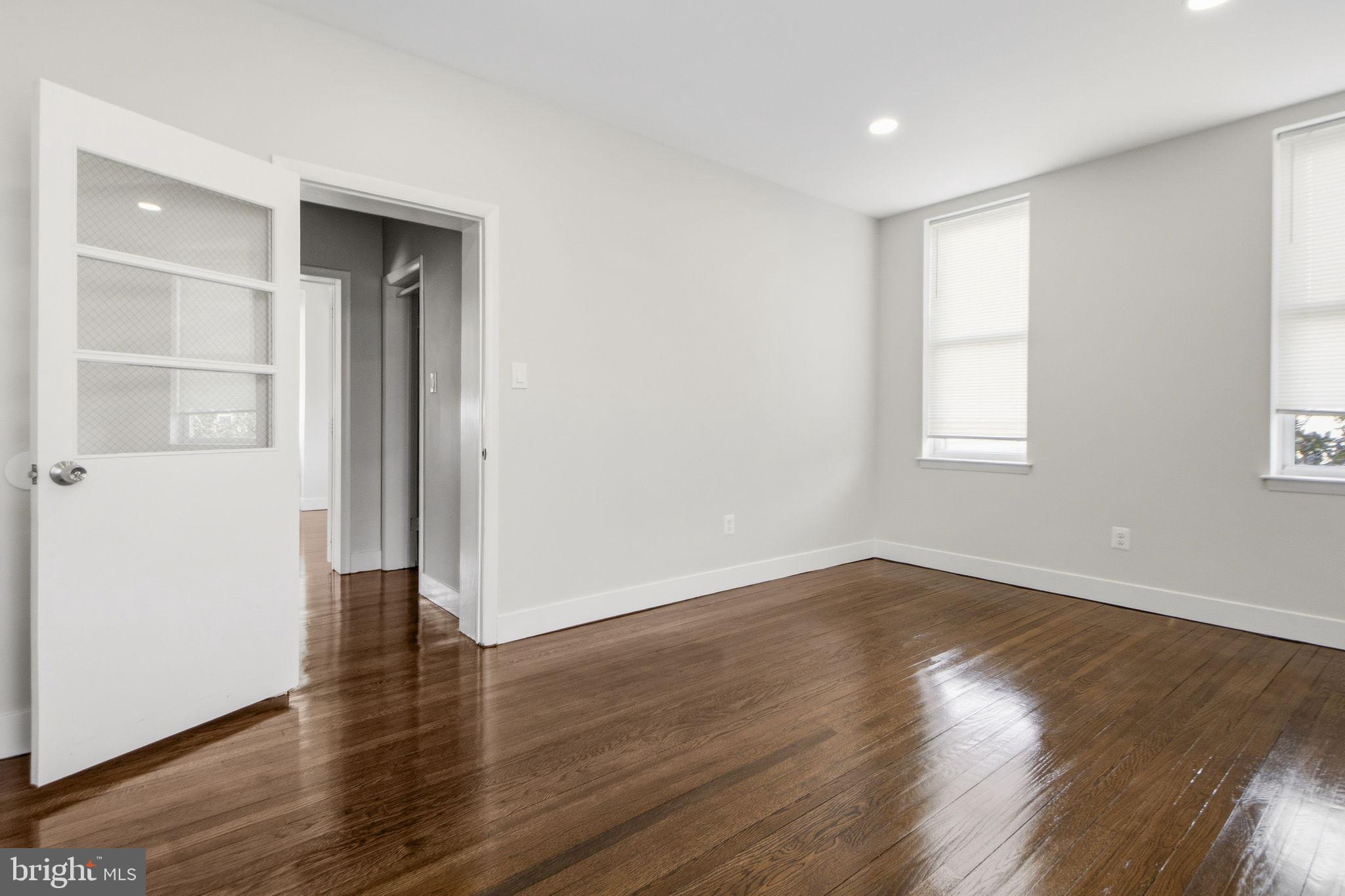 317 East Patapsco Avenue Baltimore, MD 21225 - Photo 32 of 36 Bright and airy space with polished floors.