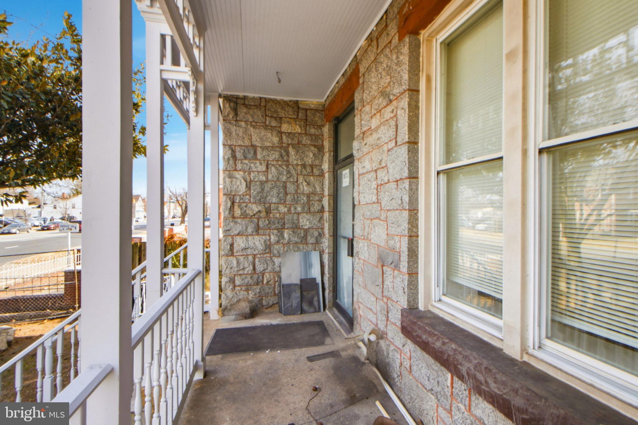 317 East Patapsco Avenue Baltimore, MD 21225 - Photo 5 of 36 Charming stone porch with inviting entryway.