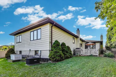 a house view with a garden space