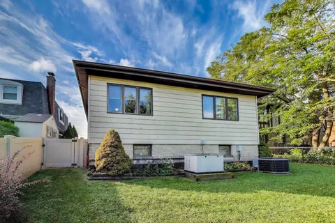 a house view with a garden space